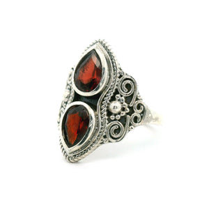 Sterling silver filigree ring with two pear-shaped garnets